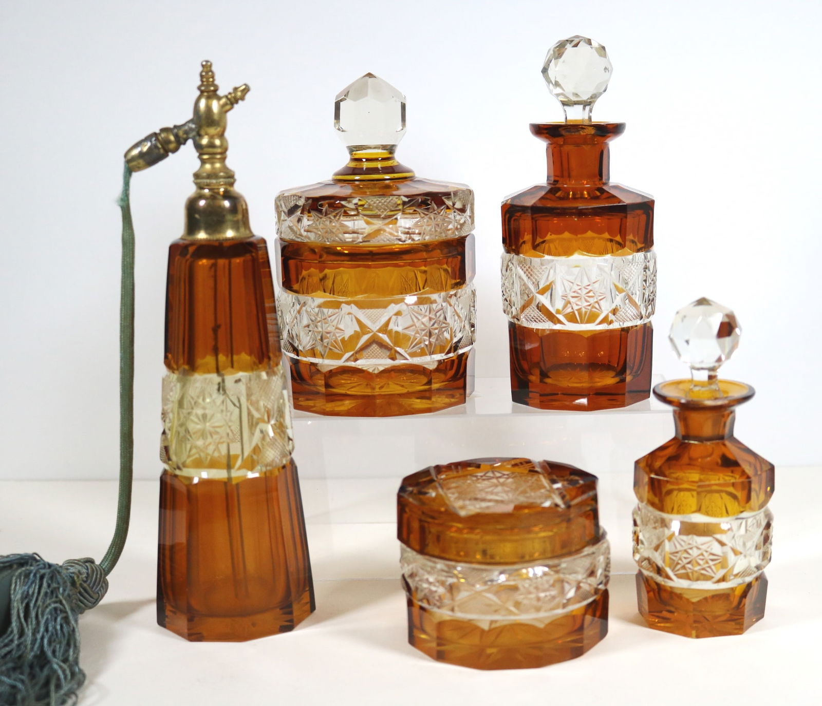 FIVE-PIECE CUT AND PANELED AMBER AND COLORLESS CRYSTAL VANITY SET, early 20th century. - Atomizer, (1 of 20)