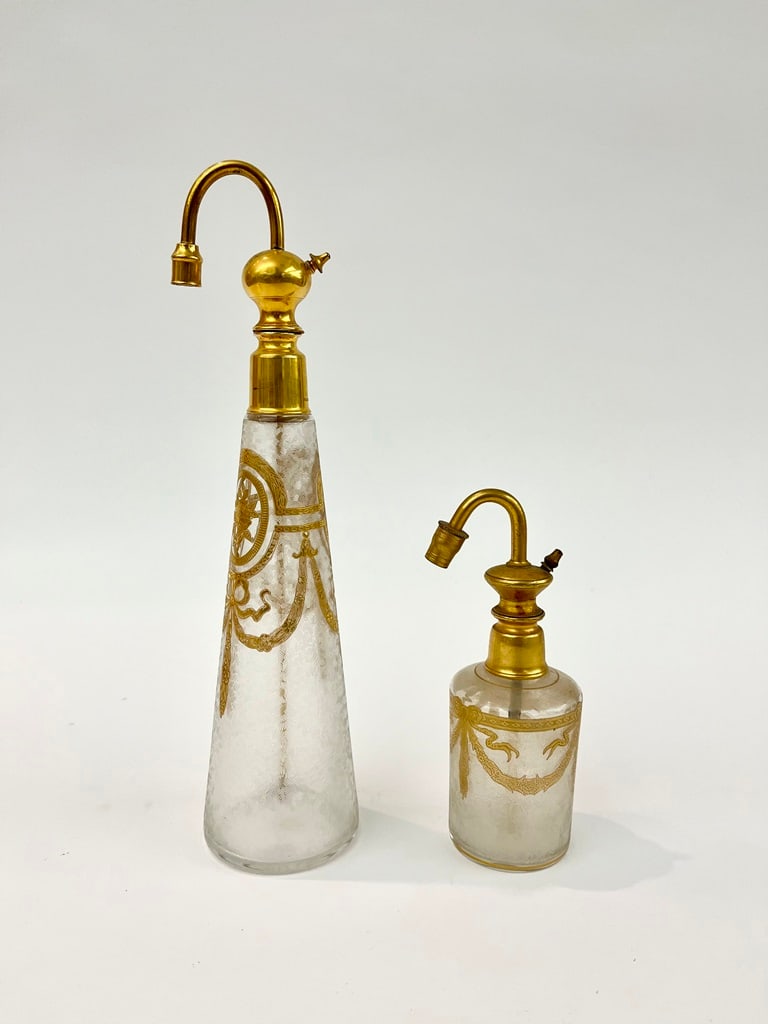 THREE EALRY 20TH CENTURY BACCARAT GILT-DECORATED CRYSTAL PERFUME ATOMIZERS, - Largest, signed, H: 12 (1 of 3)