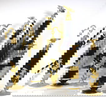 EIGHT VINTAGE BLACK AND GILT PERFUME BOTTLES AND ATOMIZERS. Some signed DeVilbiss. - Tallest, H: 9: EIGHT VINTAGE BLACK AND GILT PERFUME BOTTLES AND ATOMIZERS. Some signed DeVilbiss. - Tallest, H: 9 in.