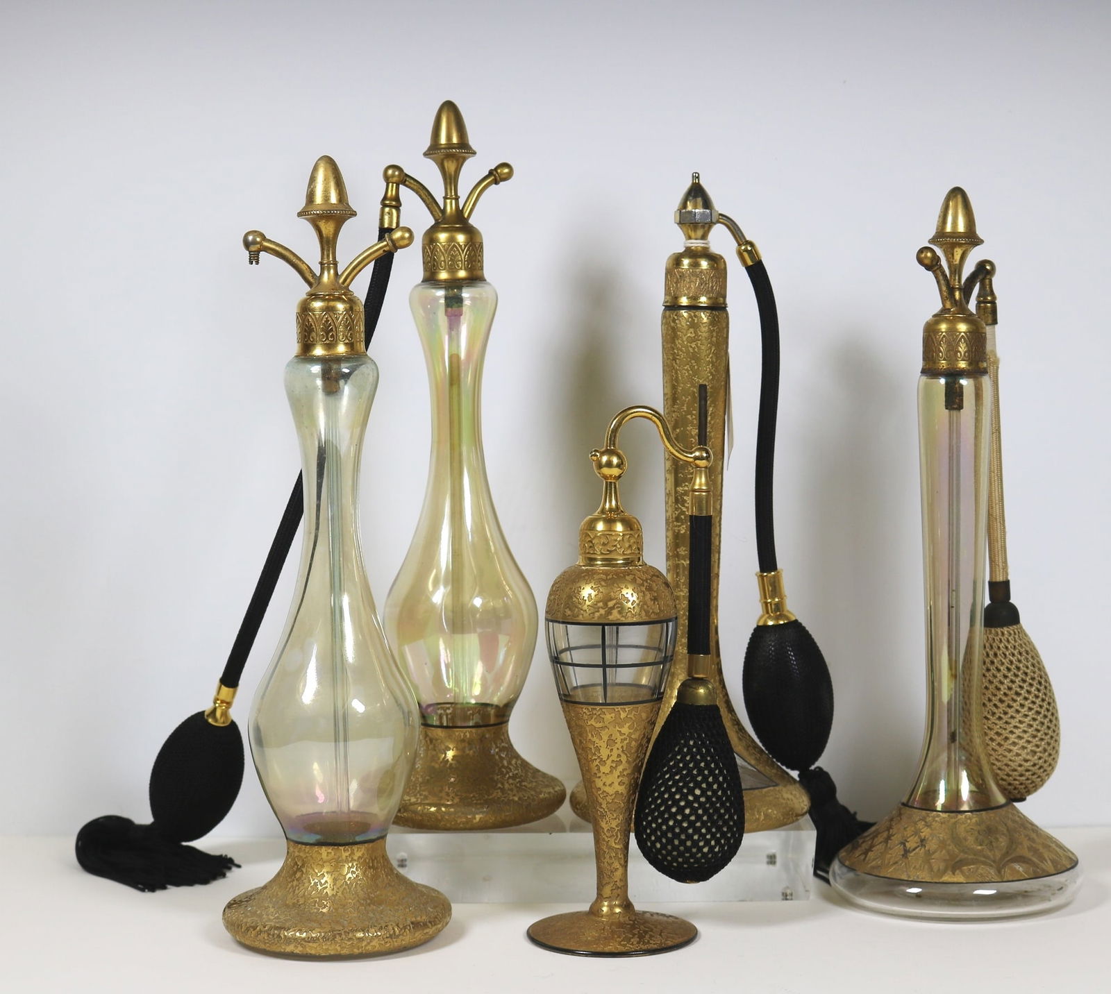 FIVE GILT-DECORATED COLORLESS CRYSTAL PERFUME ATOMIZERS. - Tallest, crystal, H: 9 1/4 in. (1 of 11)