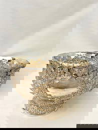 IMPRESSIVE HENNEGAN, BATES & CO. (BALTIMORE) STERLING SILVER REPOUSSE PUNCH BOWL. late 19th-early. -
