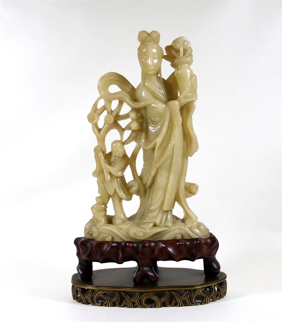 CARVED CHINESE HARDSTONE FIGURE CARVED AS KWAN YIN WITH BOY ATTENDANT IN FLOWERING LANDSCAPE, - (1 of 18)