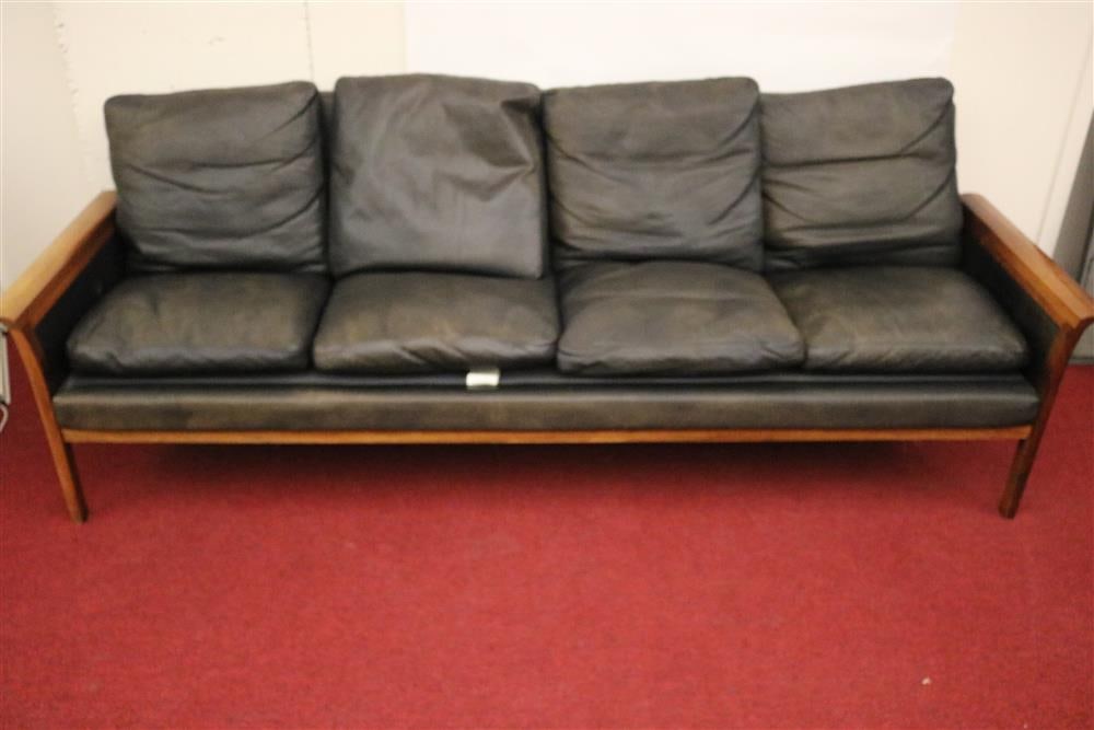 MID-CENTURY MODERN ROSEWOOD FRAMED BLACK LEATHER UPHOLSTERED THREE-CUSHION SOFA. - W: 88 in. (1 of 12)