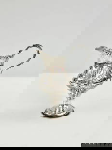 GEORGE III SILVER BALUSTER-FORM FOOTED CREAMER, Made London, 1782-3, by Hester Bateman. - H: 5 in.: GEORGE III SILVER BALUSTER-FORM FOOTED CREAMER, Made London, 1782-3, by Hester Bateman. Floral decoration - H: 5 in. Wt. 2 oz. 10 dwt.