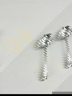 PAIR GEORGE III SILVER SERVING SPOONS, Made Londong, 1781-2, by Hester Bateman. - L: 12 1/4 in. Wt.: PAIR GEORGE III SILVER SERVING SPOONS, Made London, 1781-2, by Hester Bateman. Oval terminals; punched decoration; conjoined script monogram - L: 12 1/4 in. Wt. 6 troy oz. 10 dwt.
