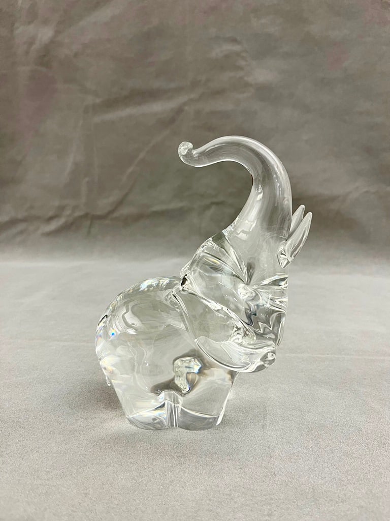 SIGNED STEUBEN COLORLESS CRYSTAL ELEPHANT, James Houston design, 1964. - H: 8 1/4 in. (1 of 4)