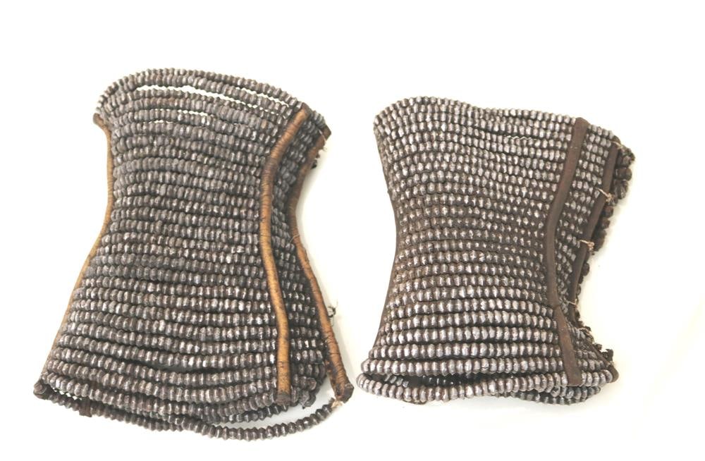 NAMIBIAN HIMBA PEOPLE KUNENE REGION FEMALE ANKLE BRACELETS, 2018.: NAMIBIAN HIMBA PEOPLE KUNENE REGION FEMALE ANKLE BRACELETS, 2018. Pair of patinated and used ankle (or "omihanga") bracelets worn by the Himba People, an indigenous people living in northern Namibia. 