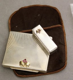 SIGNED TIFFANY & CO. STERLING SILVER, YELLOW GOLD, AND RUBY POWDER COMPACT WITH MATCHING LIPSTICK