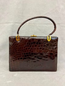 LADY'S VINTAGE BELLSTONE DARK BROWN ALLIGATOR/CROCODILE SKIN PURSE. Gold-plated clasps and