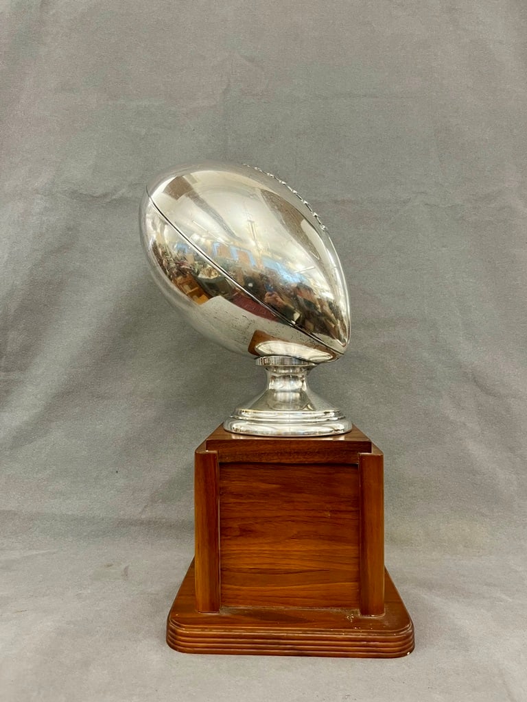 1967 SILVER PLATED FOOTBALL TROPHY ON WOODEN STAND, (1 of 6)