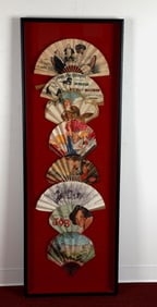 EIGHT VINTAGE PAPER LITHOGRAPHED ADVERTISING FOLDING FANS ARRANGED IN A SHADOW BOX FRAME,
