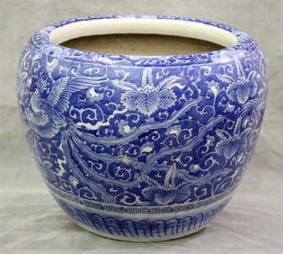 LATE 20TH CENTURY CHINESE BLUE AND WHITE PORCELAIN JARDINIERE. - H: 13 1/2"; D: 17 1/2".