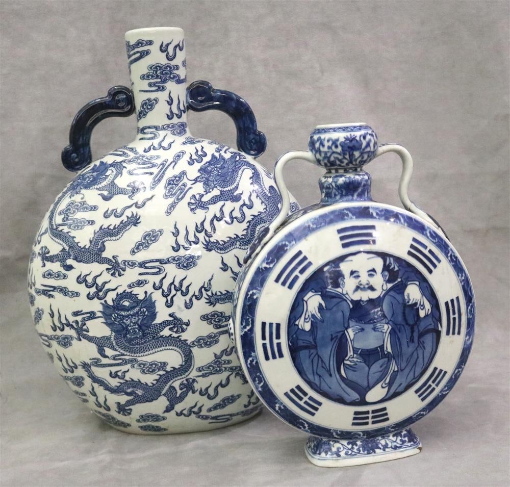 TWO CHINESE BLUE AND WHITE PORCELAIN MOON FLASKS.: TWO CHINESE BLUE AND WHITE PORCELAIN MOON FLASKS. One with overall decoration of writhing five-toed dragon, H: 18 3/4"; other with central figural decoration, H: 14".