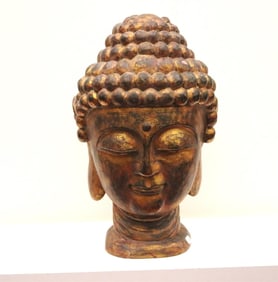 GILT-WOOD CARVED BUDDHA HEAD. - height: 21 inches.