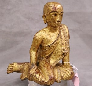 BURMESE SEATED DISCIPLE WOODEN STATUE, Mandalay Period, 19th century. - Height: 10 inches.