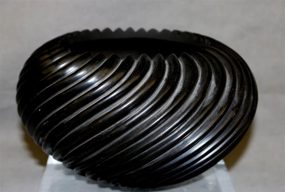 GABRIEL GONZALES (Native American, Jemez Pueblo, NM, born 1971). Black swirl-ribbed circular bowl. (1 of 10)