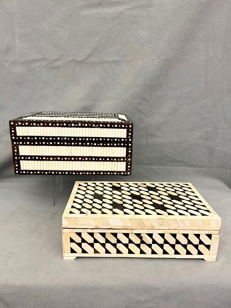TWO BONE-INLAID AND EBONIZED RECTANGULAR HINGED-TOP BOXES, AND BONE INLAID AND EBONIZED RECTANGULAR: TWO BONE-INLAID AND EBONIZED RECTANGULAR HINGED-TOP BOXES, AND BONE INLAID AND EBONIZED RECTANGULAR TABLE-TOP BOX. Geometric inlay; one in style of porcupine quill box. - Each, 14 1/4 in. x 8 1/2 in.