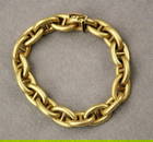 18K (750) TEXTURED YELLOW GOLD FLEXIBLE OVAL-LINK BRACELET, - L: 7 3/4 in. W: 7/16in. Wt. 1 oz. 4