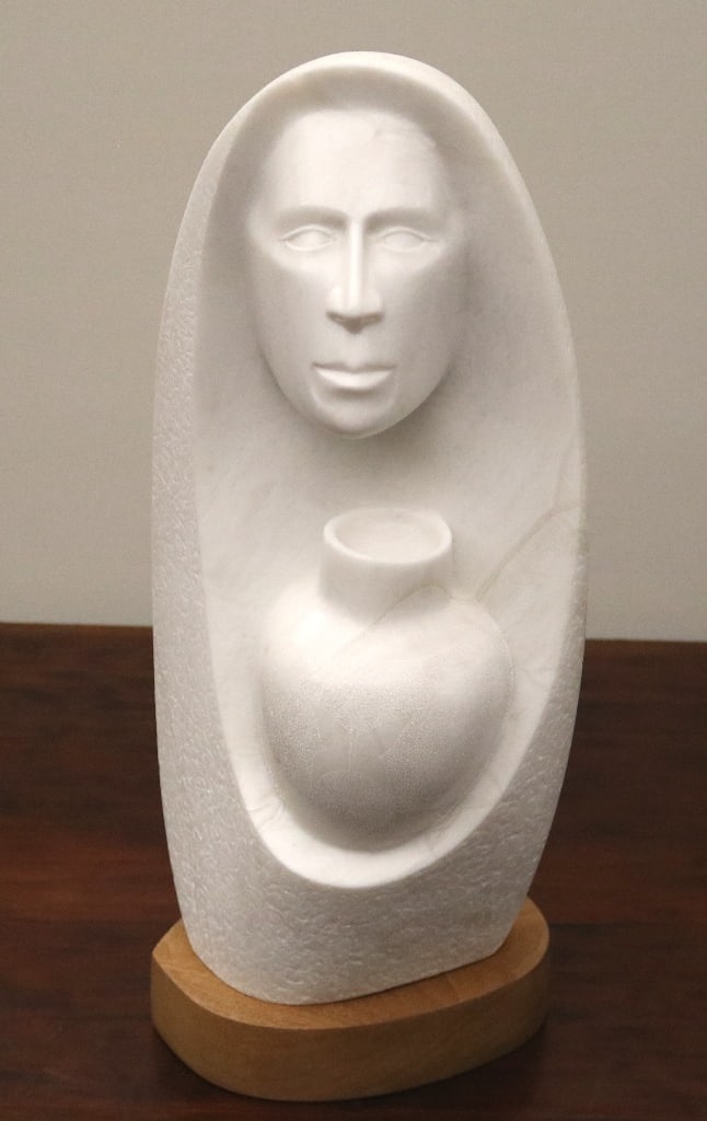 SIGNED CONTEMPORARY NATIVE AMERICAN WHITE MARBLE SCULPTURE, FACE OF WOMAN WITH POTTERY VESSEL. - (1 of 8)