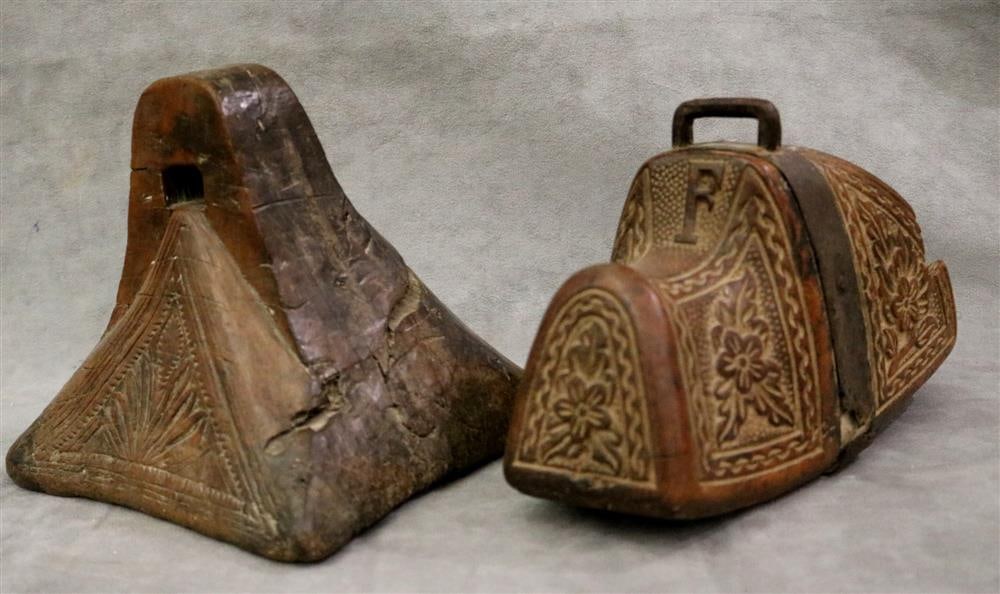 CHILEAN WOODEN STIRRUPS TWO UNITS, 19th century or earlier.: CHILEAN WOODEN STIRRUPS TWO UNITS, 19th century or earlier. Two hand carved and decorated wooden and iron mounted stirrups