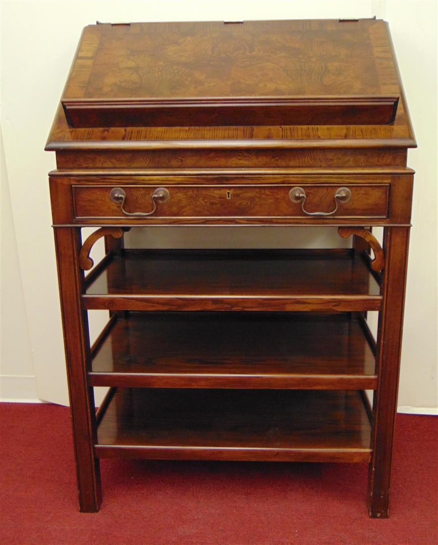 GEORGE III BURLWOOD AND MAHOGANY LECTERN DESK, - H: 49 1/2 in.; W: 32 in.; D: 20 1/2 in.: GEORGE III BURLWOOD AND MAHOGANY LECTERN DESK. Bearing brass label "Handmade by Crosby Furniture of Sussex, England." Cross-banded slant-front with book ledge; over one full-width drawer (locking, wit