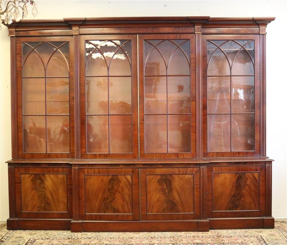 LATE GEORGE III FIGURED MAHOGANY BREAKFRONT BOOKCASE CABINET. 19th century. - H: 100 3/4 in.; W: 126 (1 of 20)