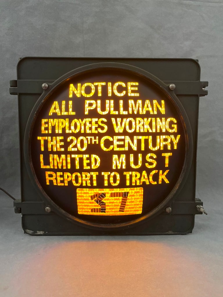 VINTAGE RAILROAD STATION PULLMAN PORTER ELECTRIC SIGN, Manufactured by Crouse Hinds, Syracuse, NY. -: VINTAGE RAILROAD STATION PULLMAN PORTER ELECTRIC SIGN, Manufactured by Crouse Hinds, Syracuse, NY. "Notice/ All Pullman Employees Working the 20th Century Limited Must Report to Track 37." For corner