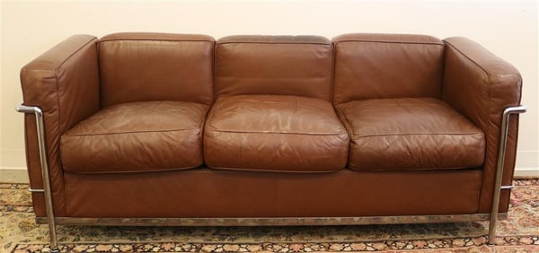 LE CORBUSIER CHROMED METAL AND CHOCOLATE BROWN LEATHER UPHOLSTERED SOFA. Model No. LC3. - L: 70 in.