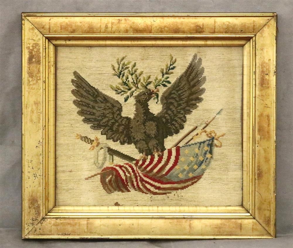 FRAMED NEEDLEPOINT PANEL STITCHED TO DEPICT EAGLE ON AMERICAN FLAG WITH LAURELS AND OTHER PATRIOTIC: FRAMED NEEDLEPOINT PANEL STITCHED TO DEPICT EAGLE ON AMERICAN FLAG WITH LAURELS AND OTHER PATRIOTIC ICONOGRAPHY, 19th century. Gilt frame