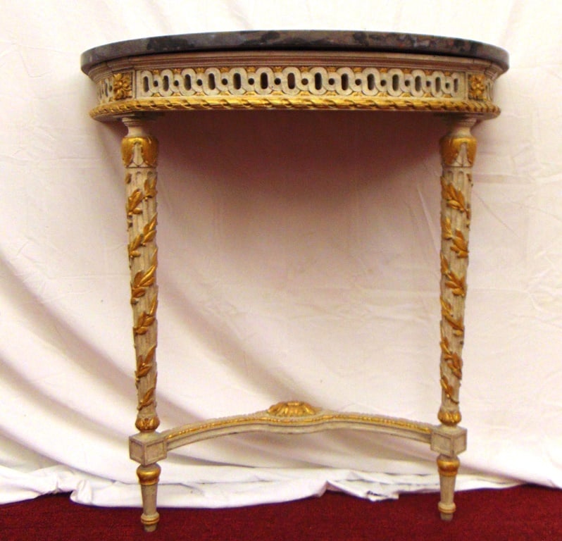 LOUIS XVI STYLE CARVED, PAINTED AND GILT-WOOD MOUNTED CONSOLE TABLE WITH MARBLE TOP, - H: 33 34 in. : LOUIS XVI STYLE CARVED, PAINTED AND GILT-WOOD MOUNTED CONSOLE TABLE WITH MARBLE TOP. Charcoal color and medium gray mottled marble top supported by pale gray carved and reticulated base with tapering,