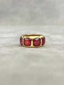 SIGNED POMELLATO 18K YELLOW GOLD AND PINK TOURMALINE BAND.