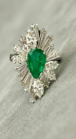 PLATINUM, DIAMOND AND EMERALD RING.