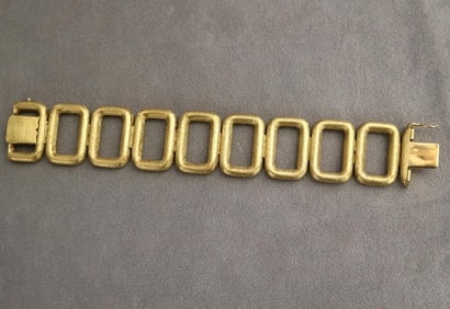 1960S 18K (750) FLORENTINED YELLOW GOLD, GEOMETRIC PANEL LINK BRACELET.