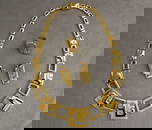 SIGNED BURLE MARX 18K BRIGHT-POLISHED AND TEXTURED GEOMETRIC LINK FLEXIBLE CHOKER WITH MATCHING RING