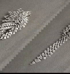 1930S HAND-CRAFTED PLATINUM AND DIAMOND ARTICULATED SPRAY PIN.