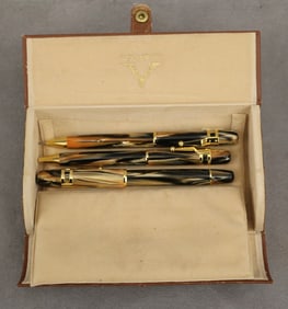 THREE VISCONTI "RAGTIME" CINNABAR CELLULOID WRITING INSTRUMENTS: FOUNTAIN PEN, ROLLER BALL PEN, AND