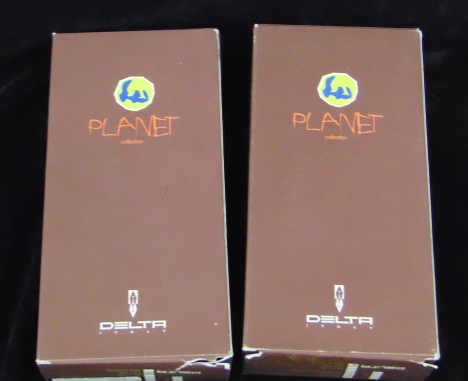 TWO DELTA "PLANET COLLECTION" VERMEIL ROLLER BALL PENS. Africa and Amazzonia models. (1 of 6)