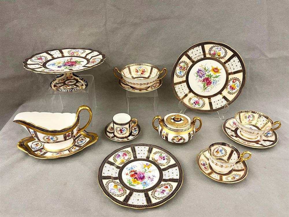 103-PIECE LARGE PARTIAL SERVICE ENGLISH PARAGON FINE BONE CHINA TABLEWARE, In pattern of service: 103-PIECE LARGE PARTIAL SERVICE ENGLISH PARAGON FINE BONE CHINA TABLEWARE, In pattern of service made for Her Majesty Queen Mary, designed by J.A. Robinson. Polychrome floral decoration with cobalt an