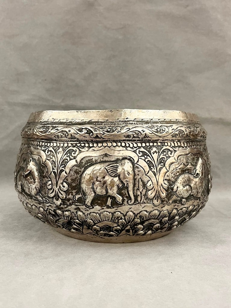 SOUTHEAST ASIAN SILVER REPOUSSE CIRCULAR BOWL, - D: 12 in. Wt. 38 troy oz. (1 of 6)