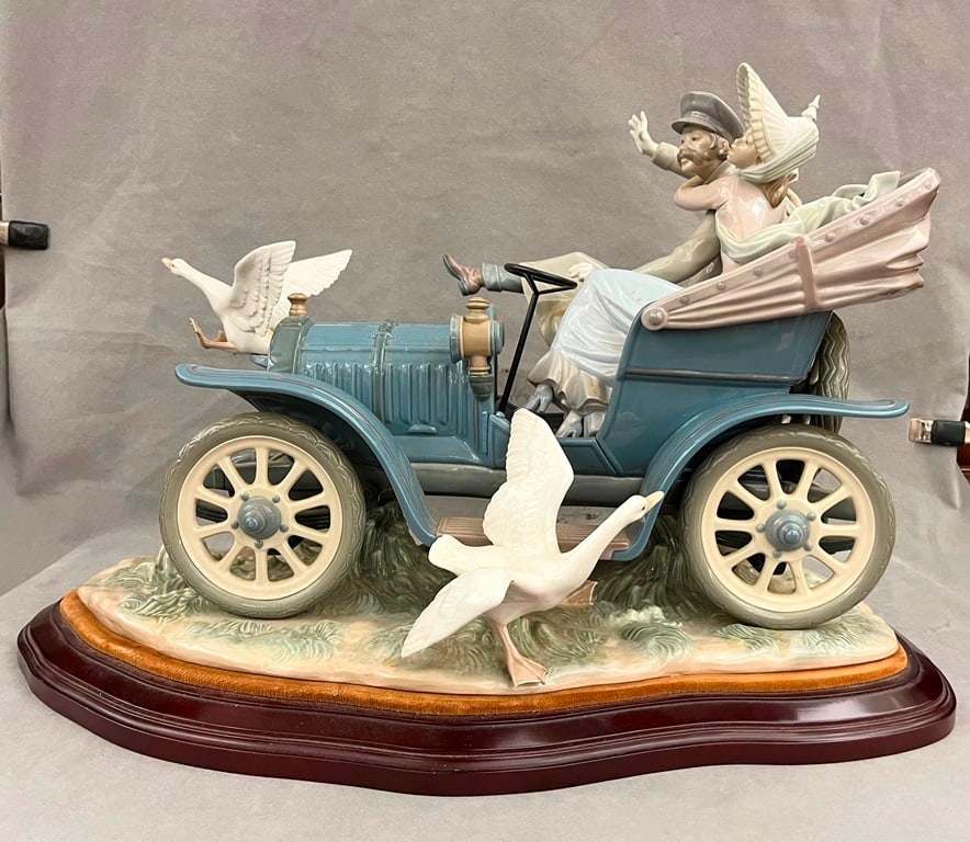 LLADRO POLYCHROMED PORCELAIN FIGURE GROUP: "CAR IN TROUBLE", - H: 16 in. L; 24 in. (1 of 11)