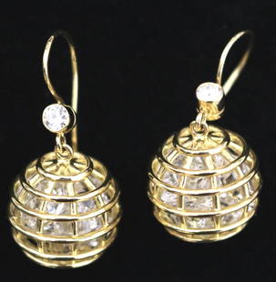 PAIR SIGNED VERDURA 18K (750) BRIGHT-POLISHED YELLOW GOLD DIAMOND AND ROCK CRYSTAL CAGED DROP: PAIR SIGNED VERDURA 18K (750) BRIGHT-POLISHED YELLOW GOLD DIAMOND AND ROCK CRYSTAL CAGED DROP EARRINGS. Each ear wire suspends bezel-set brilliant-cut round diamond weighing approx 18 ct, above freel