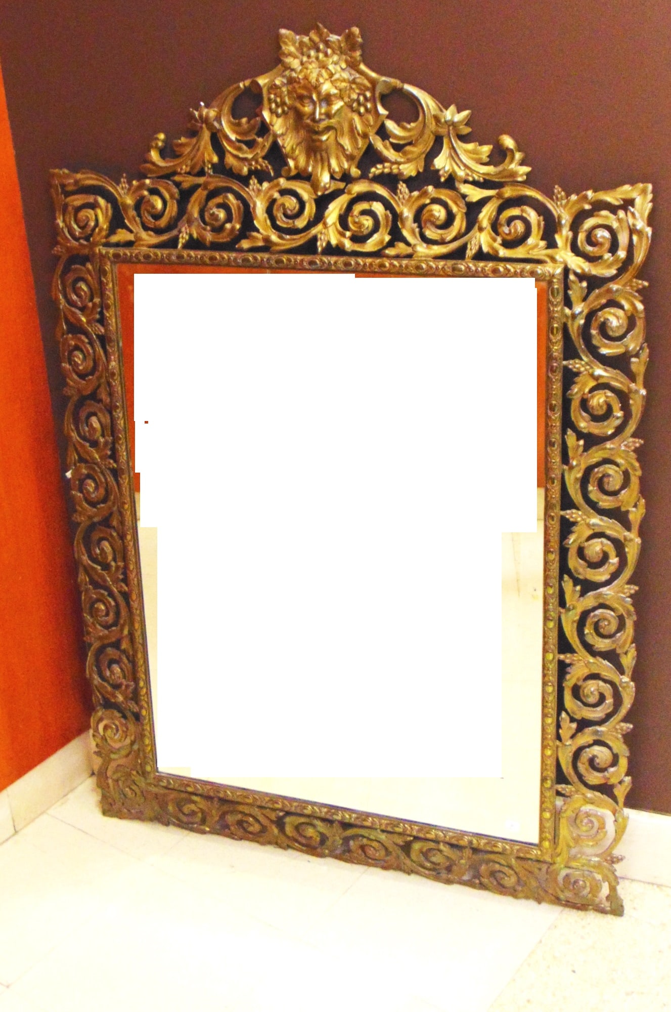 CONTINENTAL BRASS-FRAMED VERTICAL RECTANGULAR WALL MIRROR WITH MASK CREST. 19th century. - H: 51 in. (1 of 15)