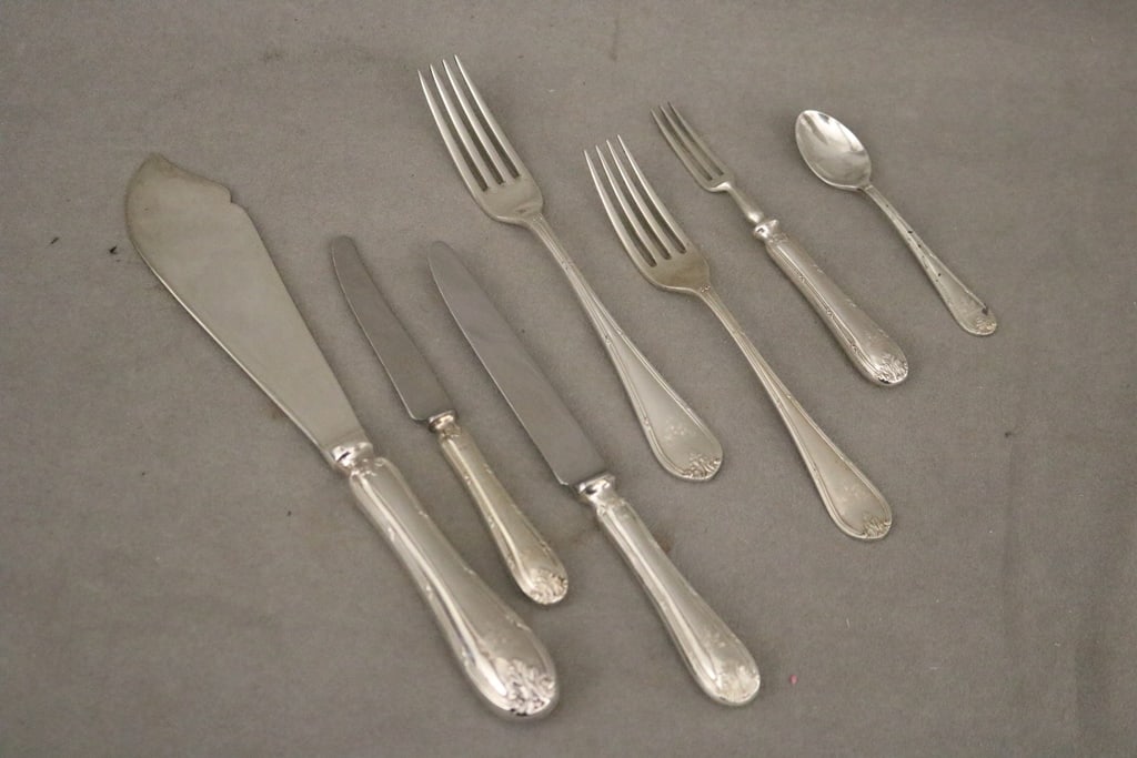 78-PIECE ENGLISH MAPPIN & WEBB "LOUIS XVI" STERLING SILVER PARTIAL FLATWARE SERVICE. - Weighable: 78-PIECE ENGLISH MAPPIN & WEBB "LOUIS XVI" STERLING SILVER PARTIAL FLATWARE SERVICE. Handles engraved with Iranian imperial lion armorial device. Including 28 silver-handle luncheon knives, two dinne