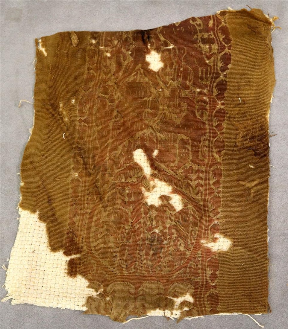 COPTIC TEXTILE FRAGMENT WITH ZOOMORPHIC AND FLORAL MOTIFS, circa 4TH-6TH CENTURY AD. - Approximate: COPTIC TEXTILE FRAGMENT WITH ZOOMORPHIC AND FLORAL MOTIFS, circa 4TH-6TH CENTURY AD. - Approximate size is 10 x 9 inch.