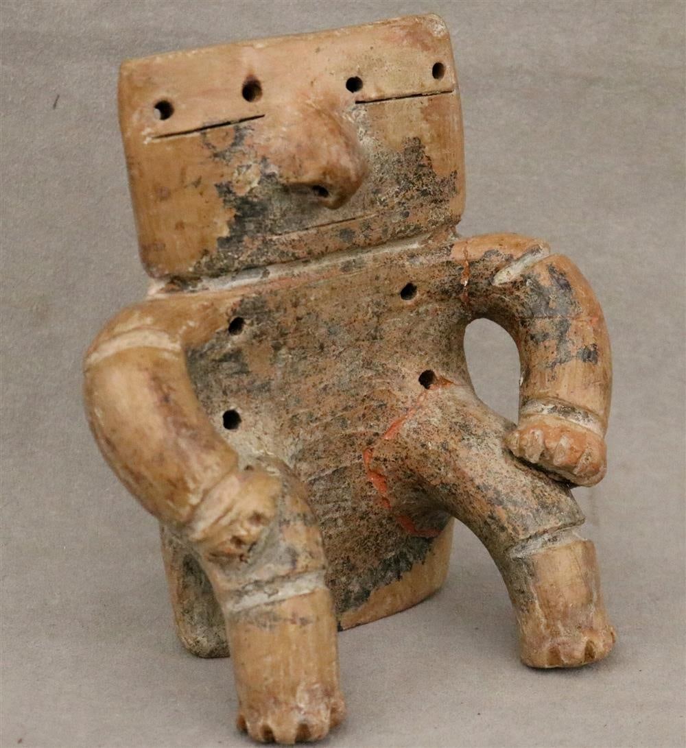 COLOMBIAN QUIMBAYA POTTERY SEATED MALE SLAB FIGURE. - Heigth:. 6.5 inches.: COLOMBIAN QUIMBAYA POTTERY SEATED MALE SLAB FIGURE. hand-built pottery male. Pre-Columbian, Colombia, Middle Cauca / Quimbaya culture, ca. 4th to 7th century CE. Note: Item has repairs and minor abras