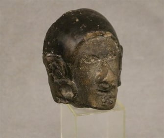 ECUADOREAN FIGURE HEAD PRE-COLUMBIAN POTTERY.. - Height (including base):. 4.75 inches.
