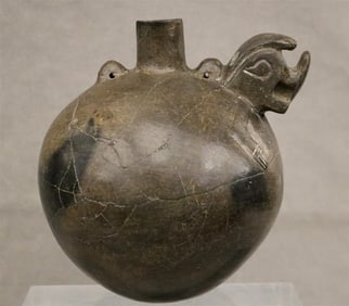 PERUVIAN CHIMU BLACKWARE PRECOLUMBIAN VESSEL, 1200 - 1450 AD. - height: 7 inches.