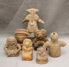 SEVEN PRE-COLUMBIAN CLAY FIGURINES. - height between 3 and 5 inches.