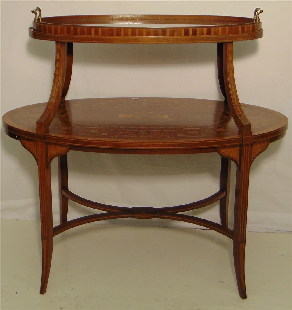 EDWARDIAN MARQUETRY INLAID MAHOGANY TWO-TIER OVAL TRAY-TOP TABLE. Both tiers inlaid with scrolling (1 of 7)