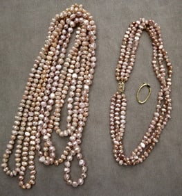 FOUR PINK FRESHWATER PEARL NECKLACES WITH A 14K YELLOW GOLD PEARL SHORTENER.